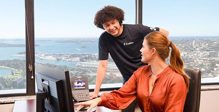 Office with an amazing view where an IT technician supports the client — 24/7 professional IT support included.